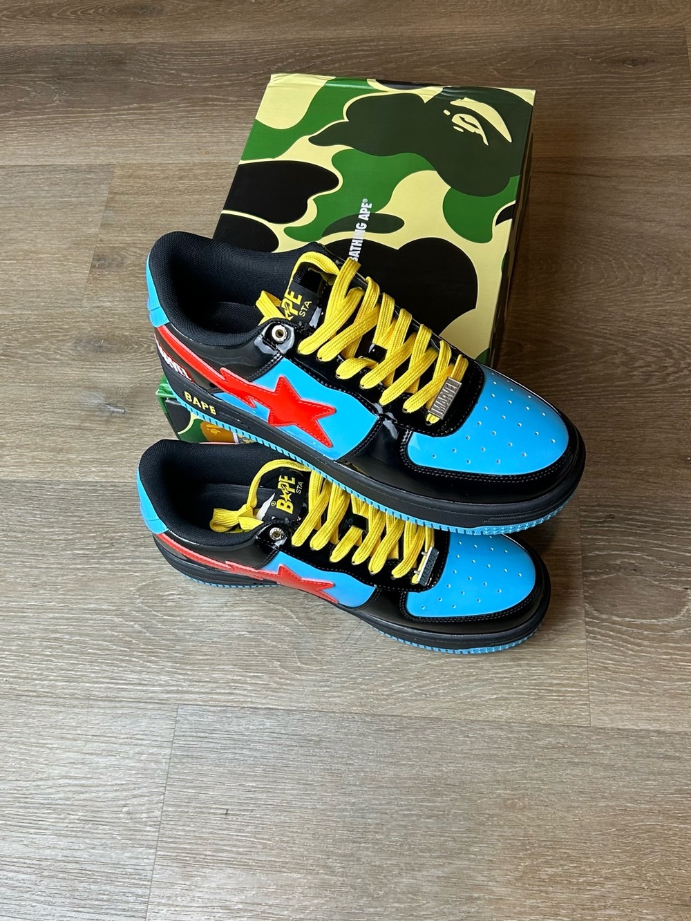 Bape ' Blue & Yellow BAPE STA Sneakers with Marvel Lace Charms